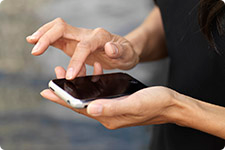 Person interacts with cell phone